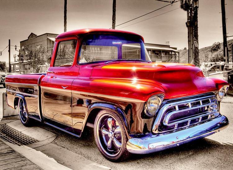 Capture the essence of country life with a classic vibrant red vehicle nestled.Red Pickup Truck - Diamondartlove