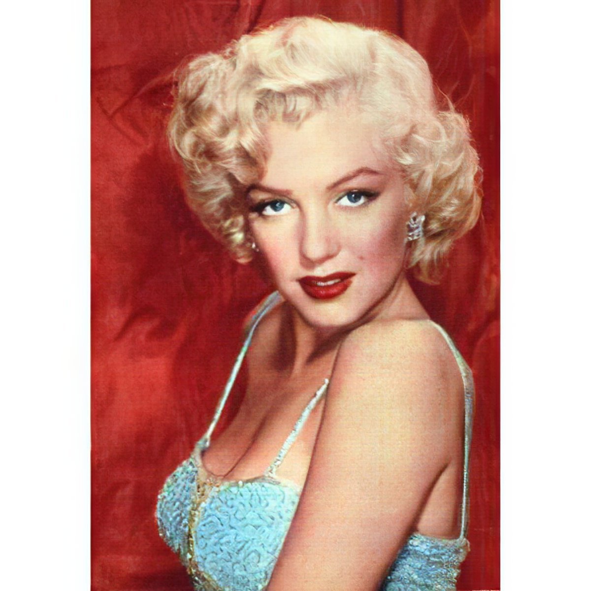 Admire Marilyn Monroe's captivating charm in vibrant color.Marilyn Monroe - Diamondartlove